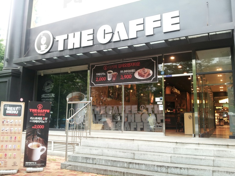 Located at the beginning of the downtown strip of Gimhae in a relatively new building, The Caffe is also the franchise presently operating throughout the new NC department store in Jangsan. You can get a double shot Americano for 2,000 won, which is about all it has going for it. It's not very good.